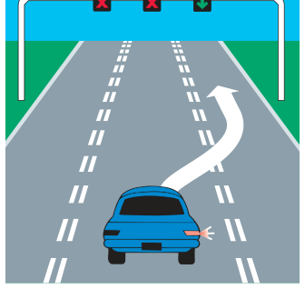 A car moving out of a lane marked with a red X into an adjacent lane marked with a green arrow.