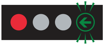 Alberta road sign: Green arrow with red light