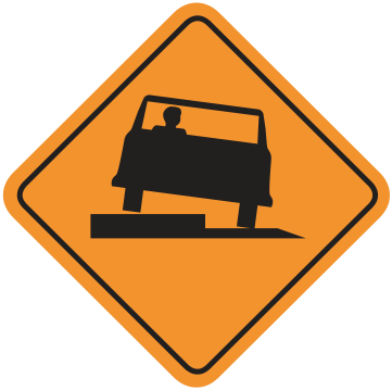 Alberta road sign: Uneven pavement